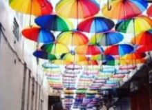نماد چتری کاریکاتوری از شهرسازی دوگنبدان